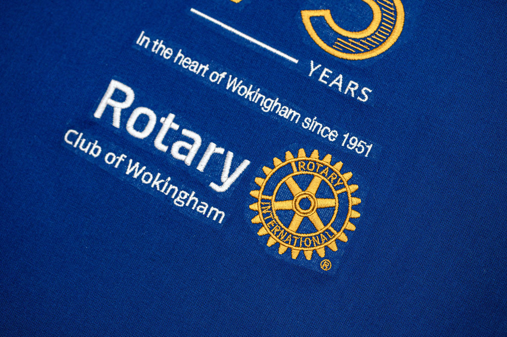 Rotary Club of Wokingham logo on a blue background